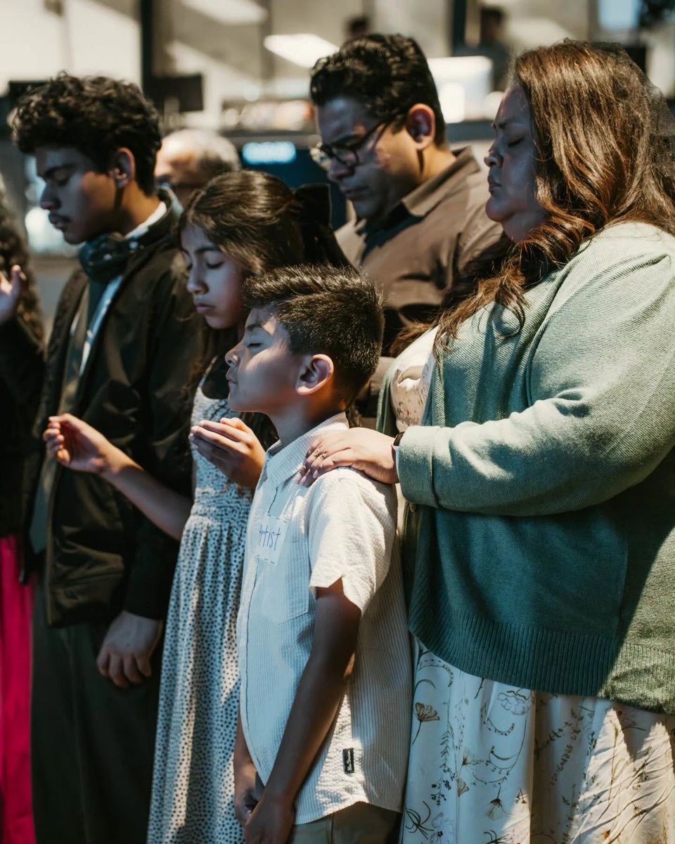 Family praying together
